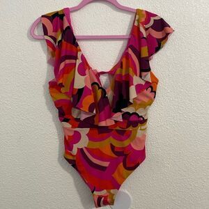 NWT- Trina Turk-pink and orange wave print ruffle neck one piece swimsuit-Size 8